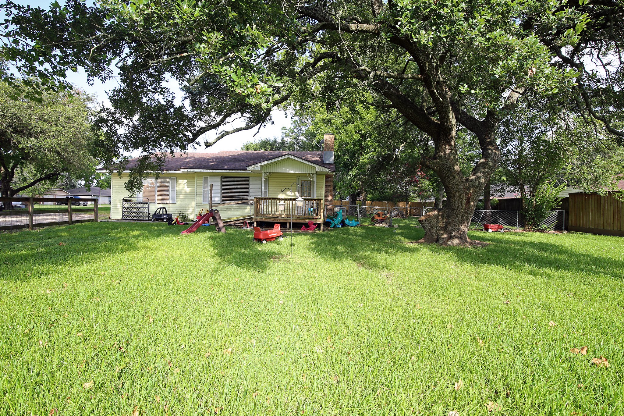 4406 FM 646 Road Santa Fe, TX 77510 - Photo 2 of 26 Big Front yard with a beautiful Oak tree!