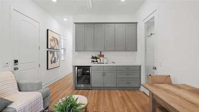 a kitchen with stainless steel appliances a stove a sink and a refrigerator