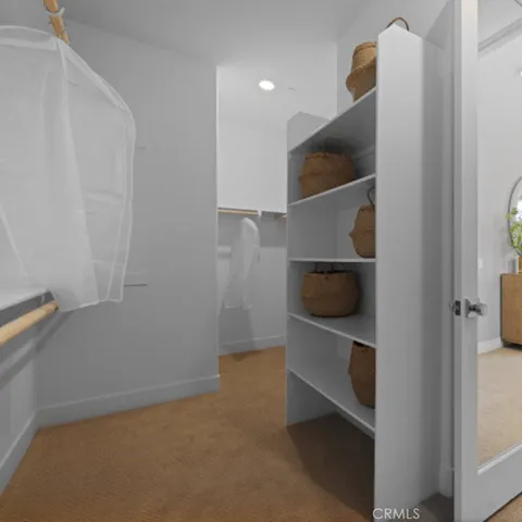 a room with a closet and utility room