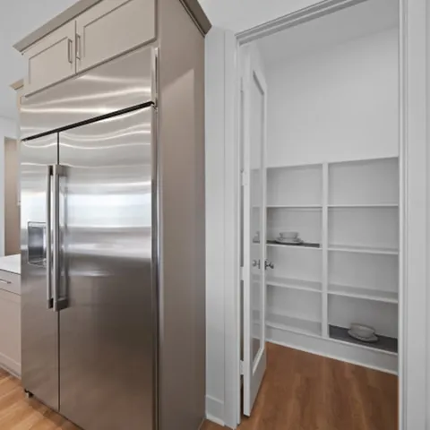 a refrigerator freezer sitting in a kitchen