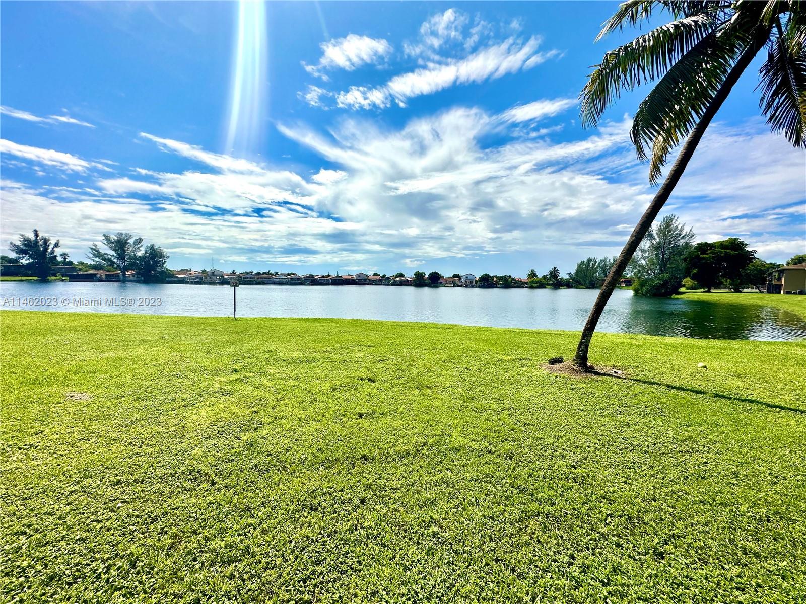 2580 West 67th Place, Unit 1011 Hialeah, FL 33016 - Photo 20 of 23 a view of an ocean with a swimming pool