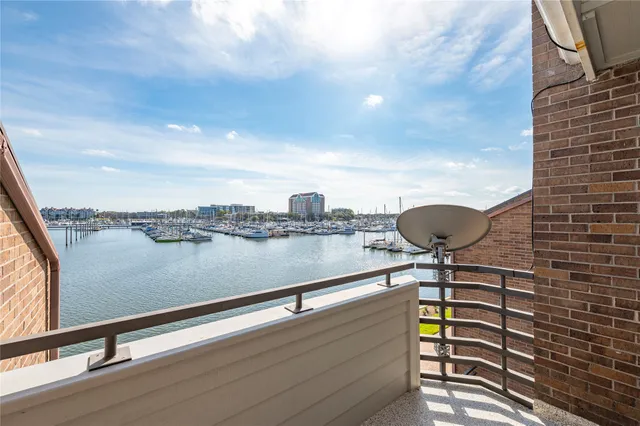 a view of swimming pool from a balcony