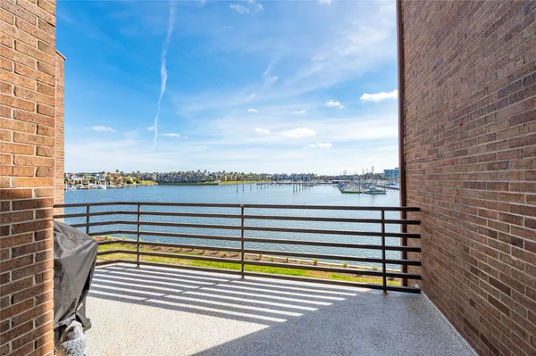 a view of a balcony with city view