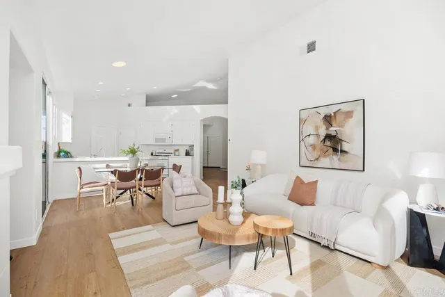 a living room with furniture and a table