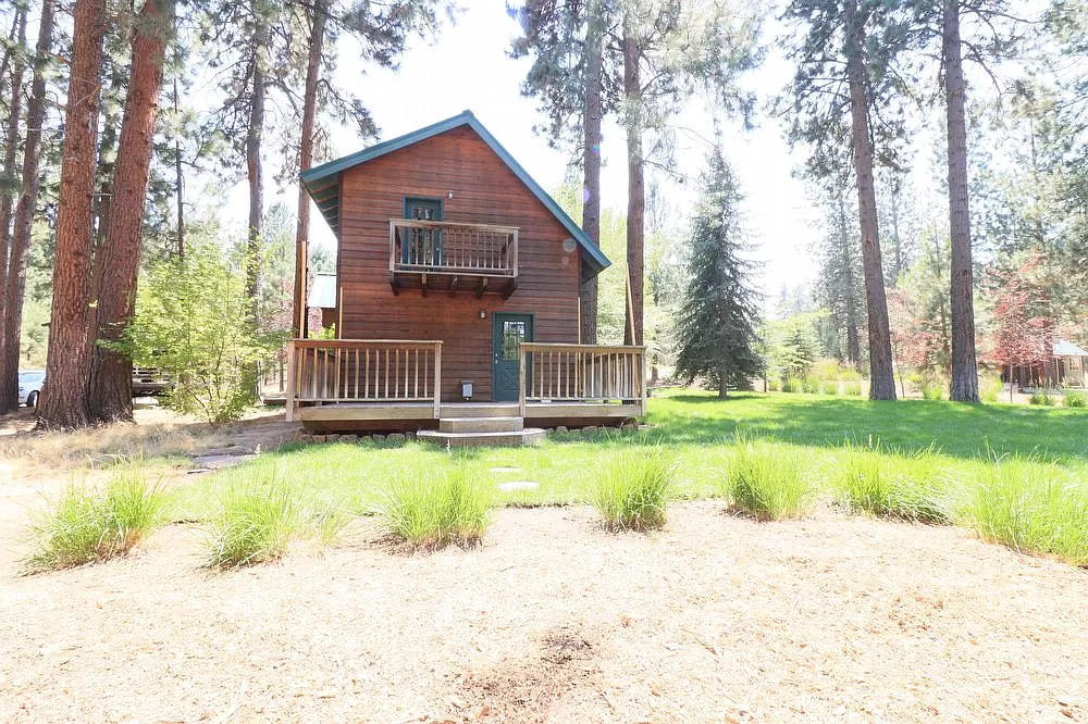 60448 Zuni Road Bend, OR 97702 - Photo 24 of 27 View of house and balcony and backyard..