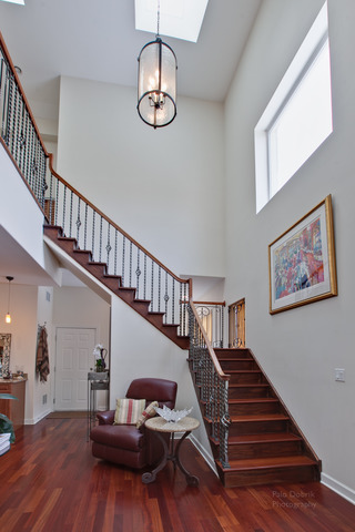 690 Lyster Road Highwood, IL 60040 - Photo 14 of 25 a view of entryway and hall with wooden floor
