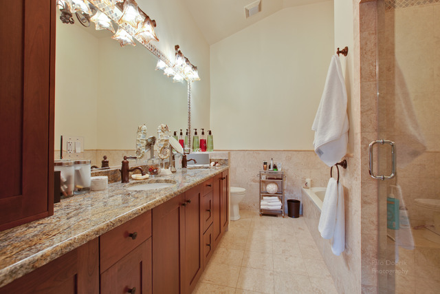 690 Lyster Road Highwood, IL 60040 - Photo 19 of 25 a bathroom with a double vanity sink and a mirror
