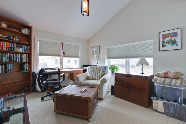 690 Lyster Road Highwood, IL 60040 - Photo 22 of 25 a living room with furniture and a window