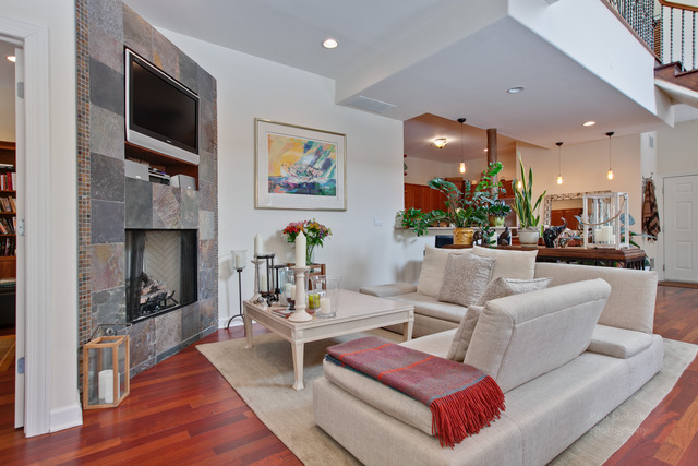 690 Lyster Road Highwood, IL 60040 - Photo 4 of 25 a living room with furniture and a fireplace