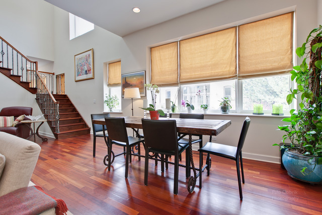 690 Lyster Road Highwood, IL 60040 - Photo 5 of 25 a view of a dining room with furniture window and wooden floor