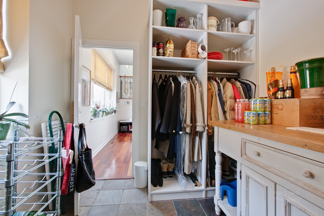 690 Lyster Road Highwood, IL 60040 - Photo 10 of 25 a view of walk in closet with clothes and shoes