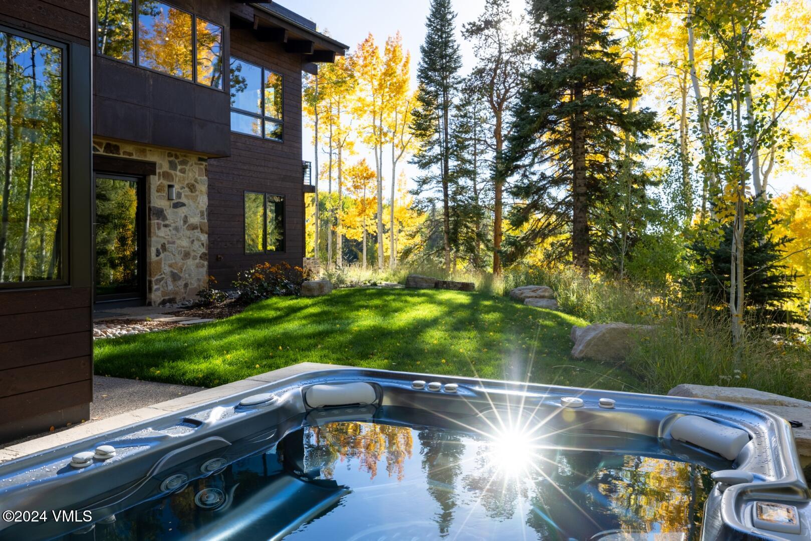 84 Shooting Star Avon, CO 81620 - Photo 35 of 48 84_shooting_star_fall_hottub_a