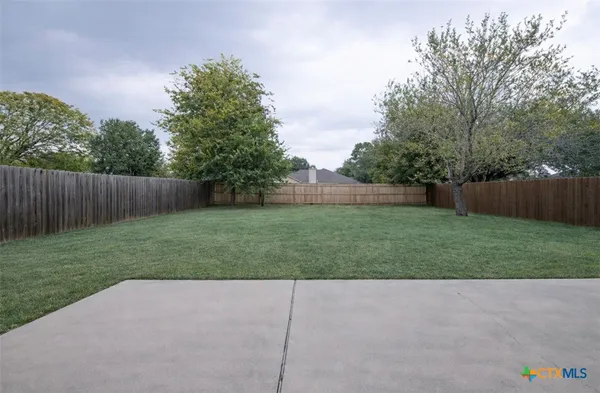 a view of outdoor space and yard