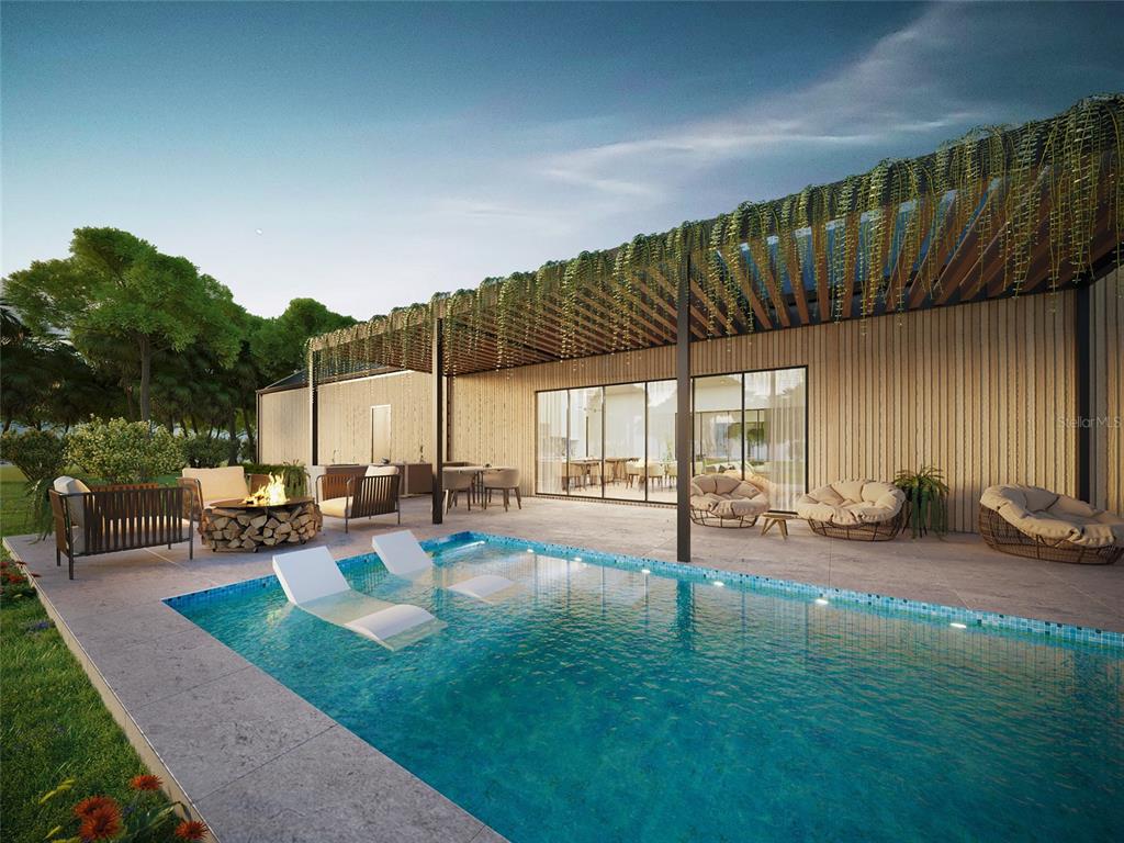 Alpinia Rd Port North Port, FL 34288 - Photo 2 of 4 a view of a backyard with sitting area