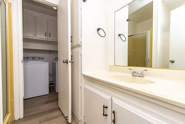 a bathroom with a bathtub and a sink