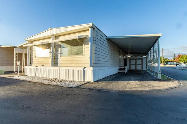 a view of a house with a porch