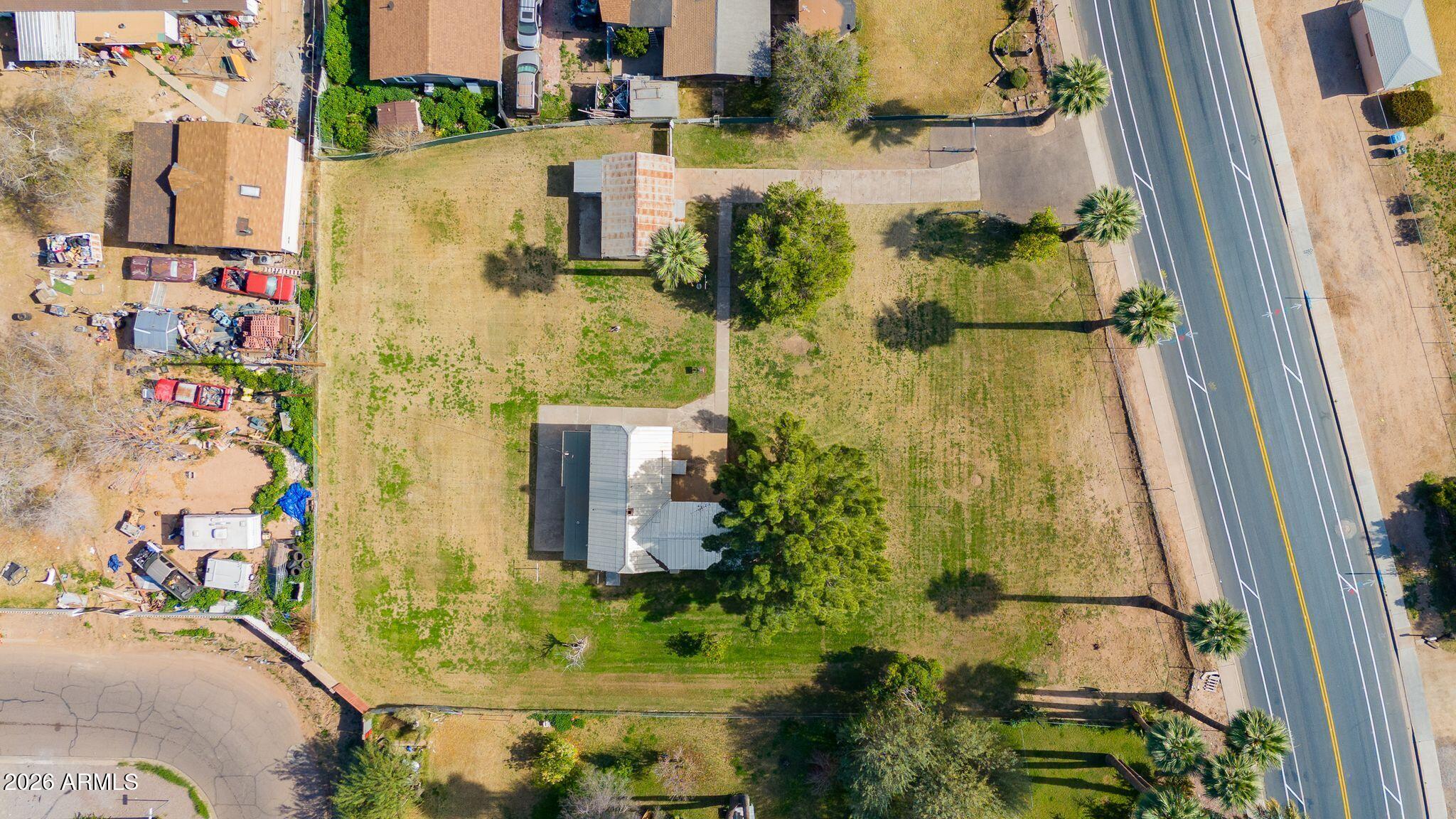 316 West Roeser Road Phoenix, AZ 85041 - Photo 29 of 35 an aerial view of residential house with outdoor space