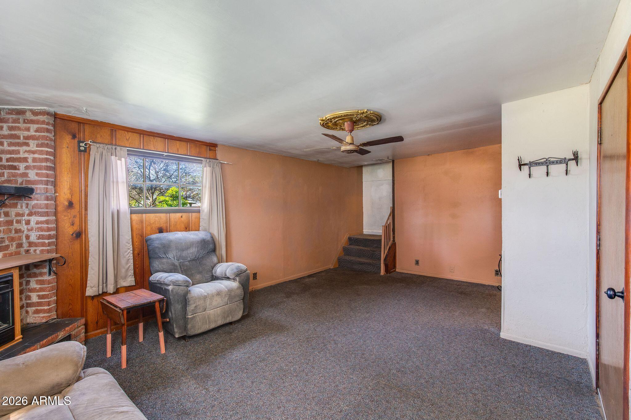 316 West Roeser Road Phoenix, AZ 85041 - Photo 6 of 35 a living room with furniture and a window