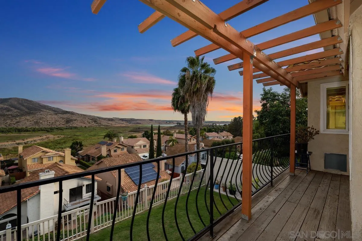 10145 Greenleaf Road Spring Valley, CA 91977 - Photo 2 of 37 a view of a balcony with wooden floor and fence