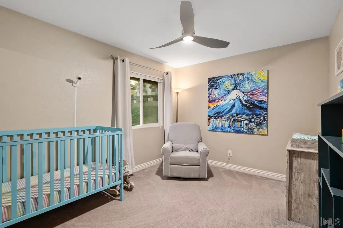 10145 Greenleaf Road Spring Valley, CA 91977 - Photo 28 of 37 a bedroom with furniture and a window