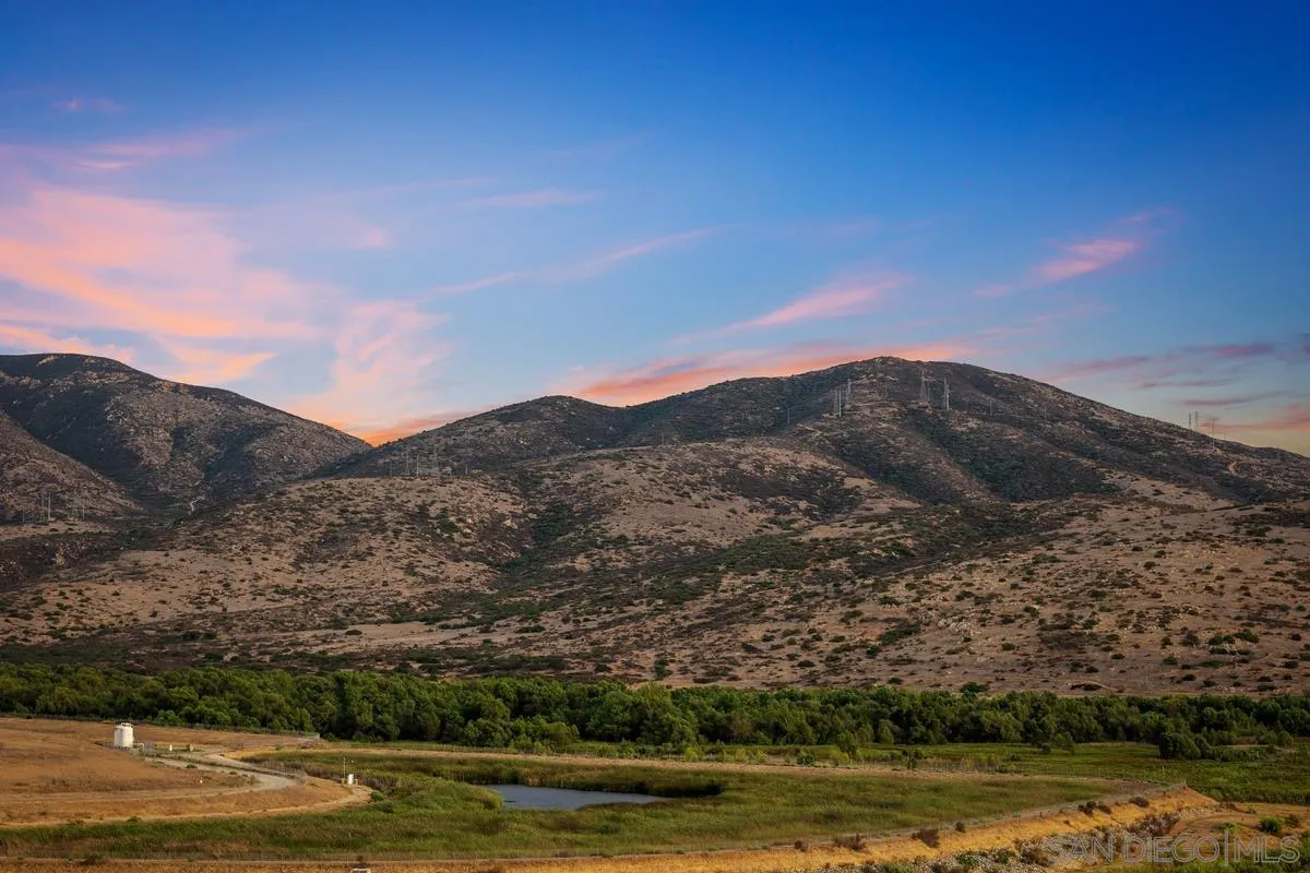 10145 Greenleaf Road Spring Valley, CA 91977 - Photo 5 of 37 a view of lake with mountain