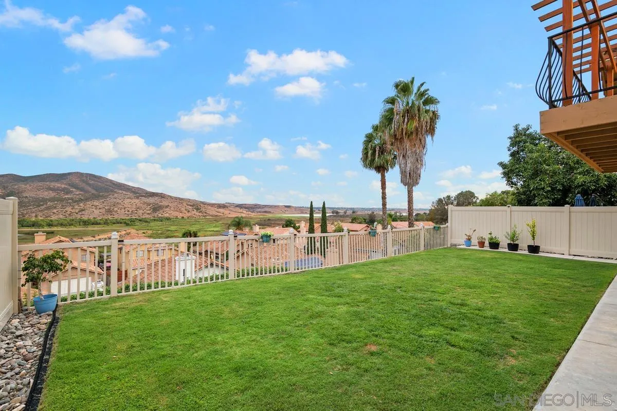 10145 Greenleaf Road Spring Valley, CA 91977 - Photo 6 of 37 a view of a pathway with a big yard