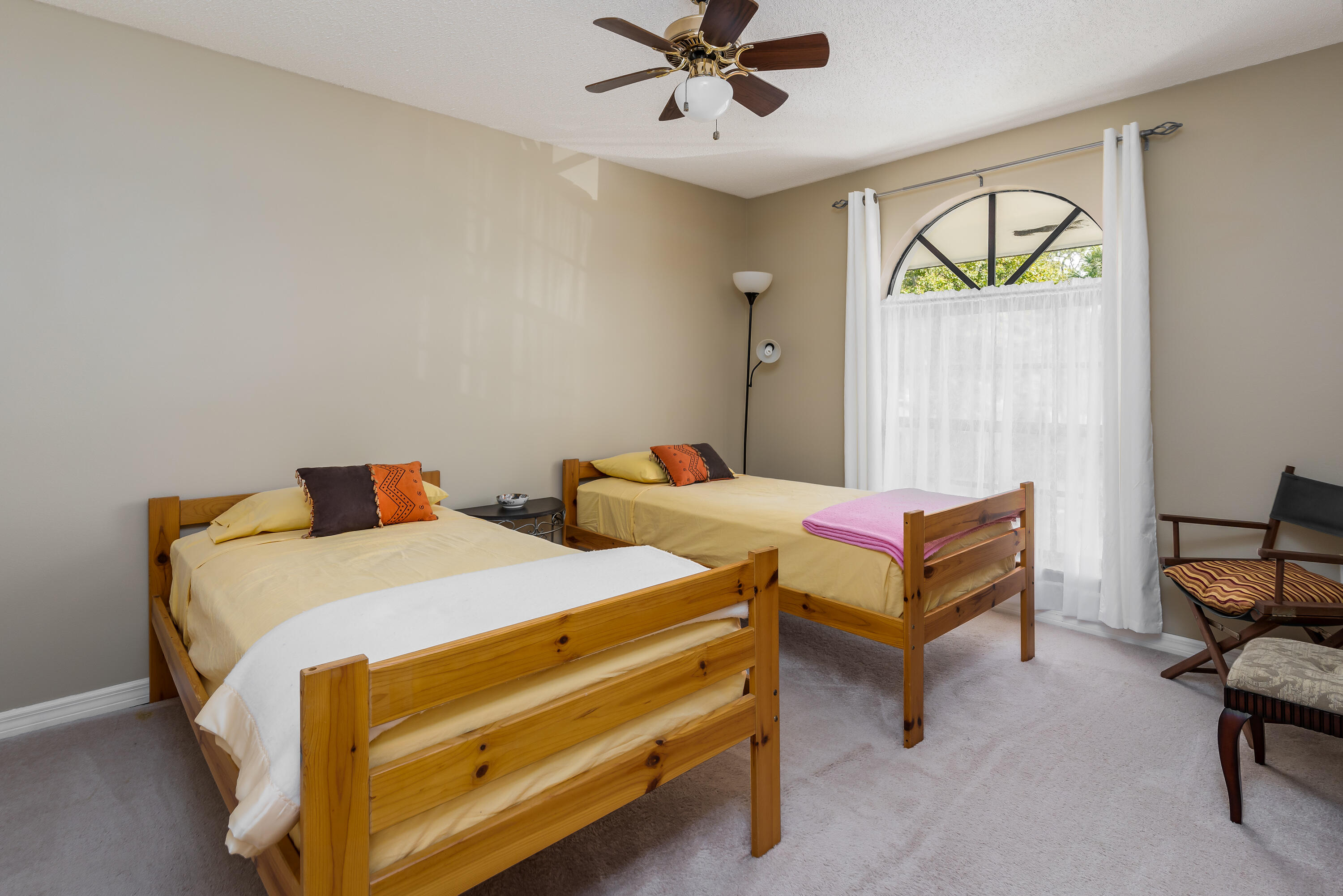 809 Augusta Boulevard, Unit 6 Naples, FL 34113 - Photo 14 of 24 a bedroom with bed and a window