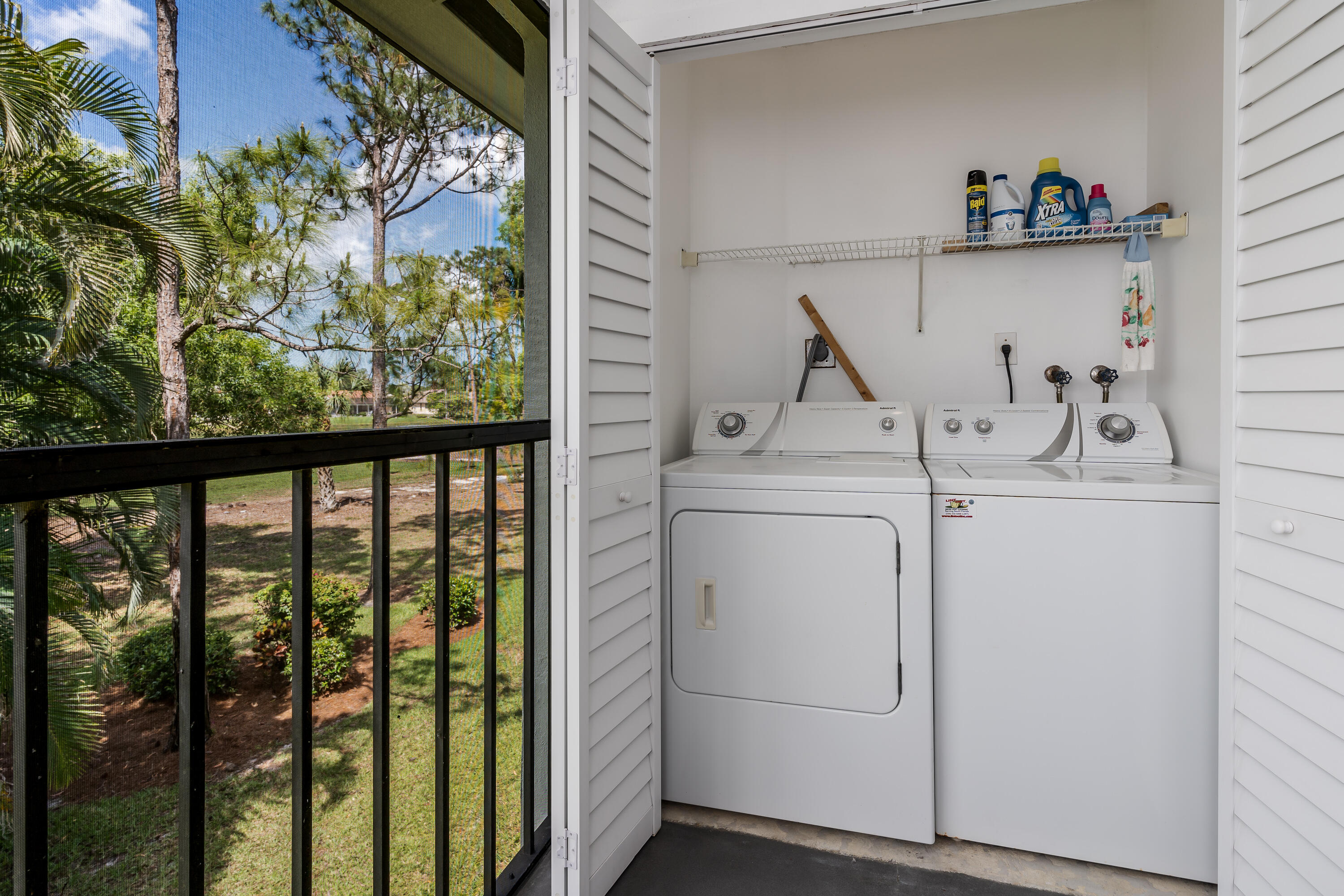 809 Augusta Boulevard, Unit 6 Naples, FL 34113 - Photo 19 of 24 a utility room with dryer and washer