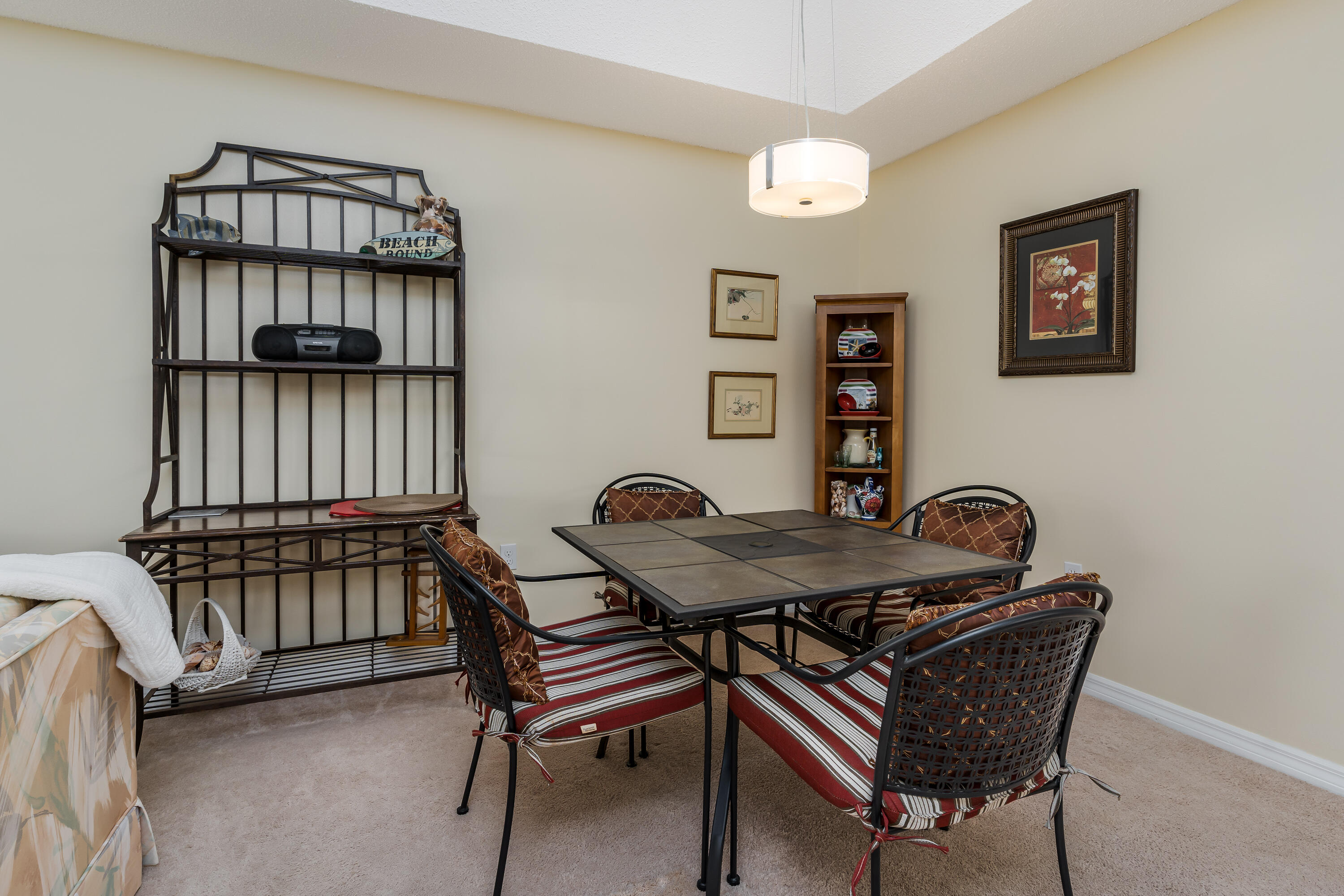 809 Augusta Boulevard, Unit 6 Naples, FL 34113 - Photo 4 of 24 a dining room with furniture and window