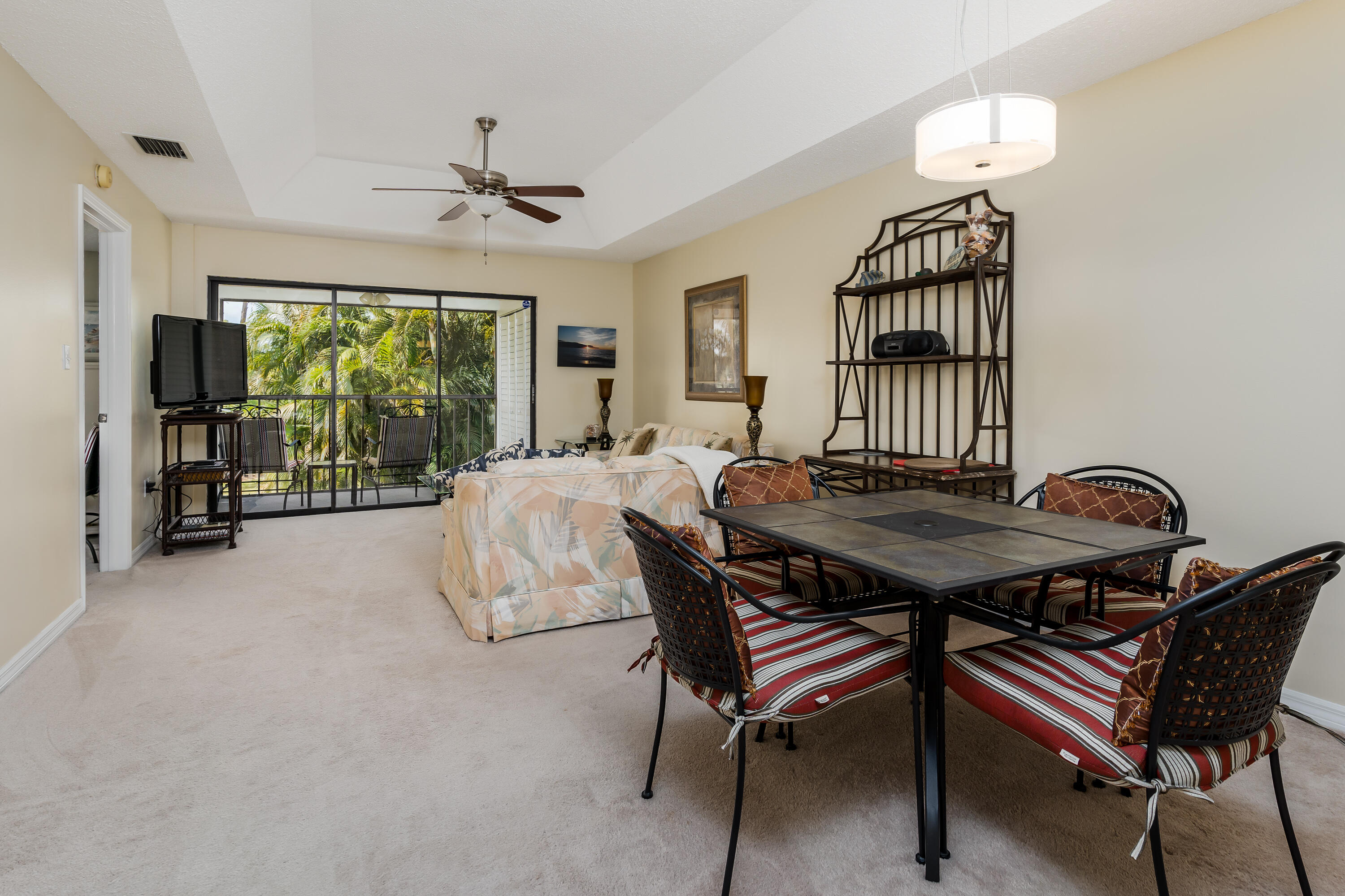 809 Augusta Boulevard, Unit 6 Naples, FL 34113 - Photo 7 of 24 a view of a livingroom with furniture and window