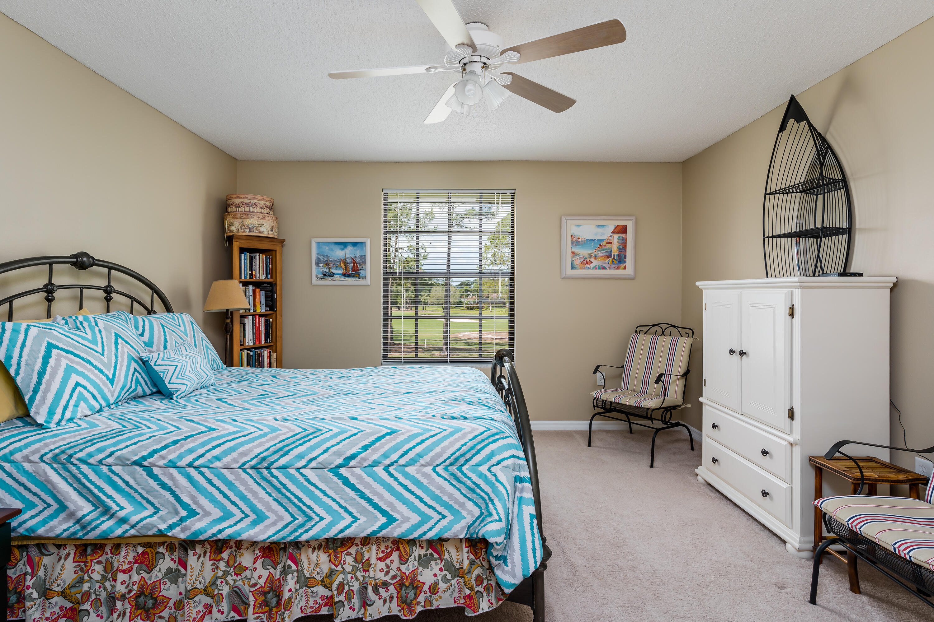 809 Augusta Boulevard, Unit 6 Naples, FL 34113 - Photo 10 of 24 a bedroom with a bed furniture and a window