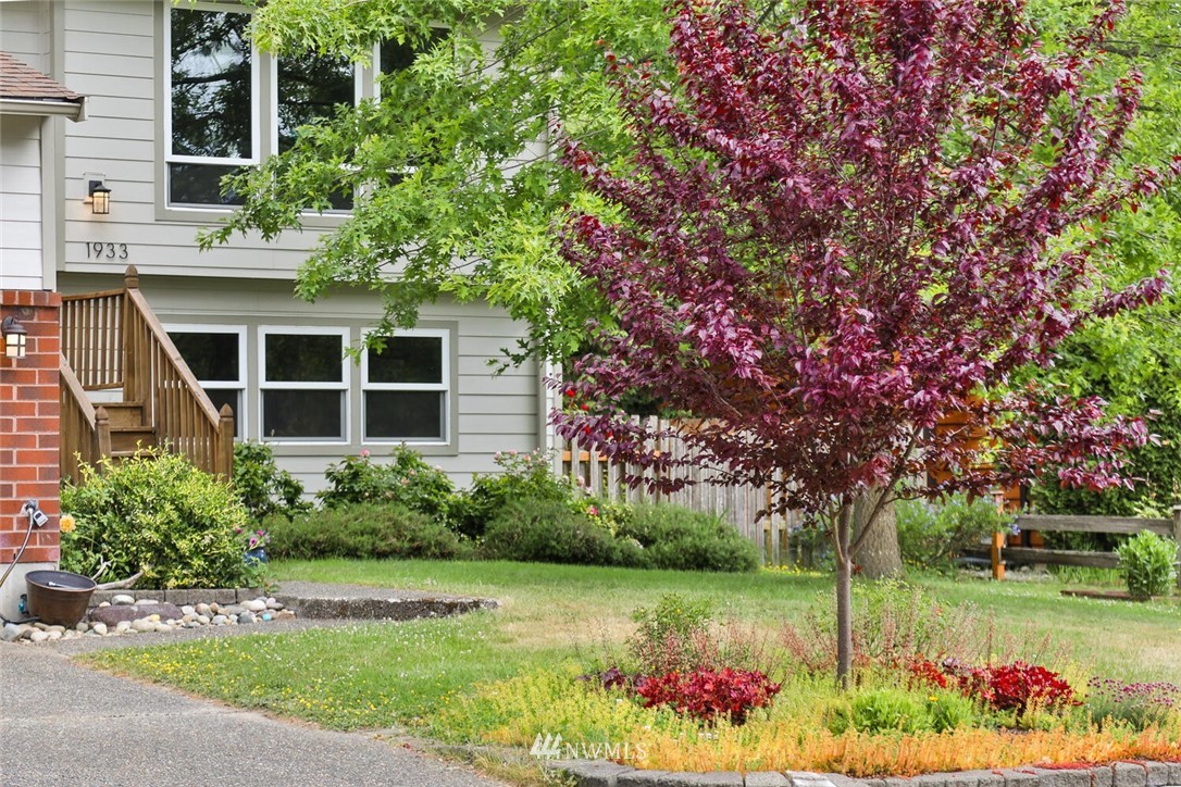 1933 169th Place Southeast Bothell, WA 98012 - Photo 2 of 34 a view of a house with a yard and potted plants