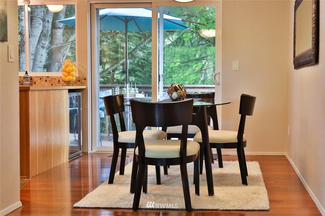 1933 169th Place Southeast Bothell, WA 98012 - Photo 14 of 34 a dining room with furniture and wooden floor