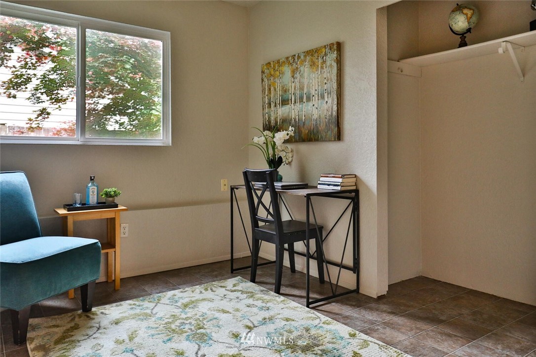 1933 169th Place Southeast Bothell, WA 98012 - Photo 26 of 34 a view of a workspace room with wooden floor windows