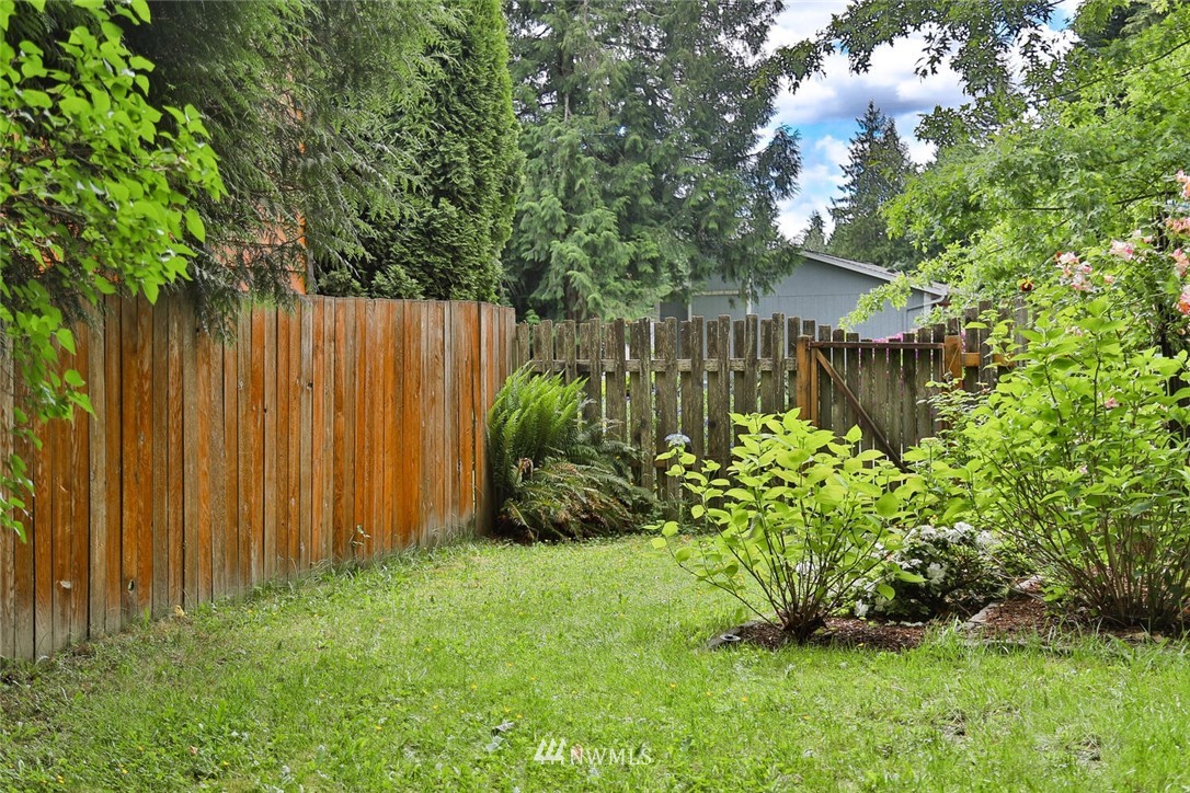 1933 169th Place Southeast Bothell, WA 98012 - Photo 33 of 34 a garden with plants in front of it