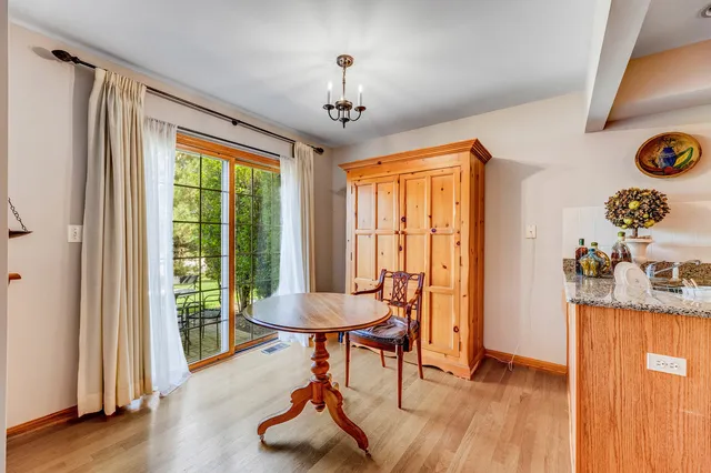 a view of a room with furniture window and wooden floor