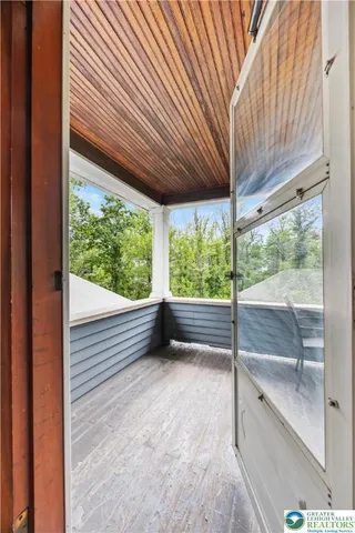 a view of room with a large window