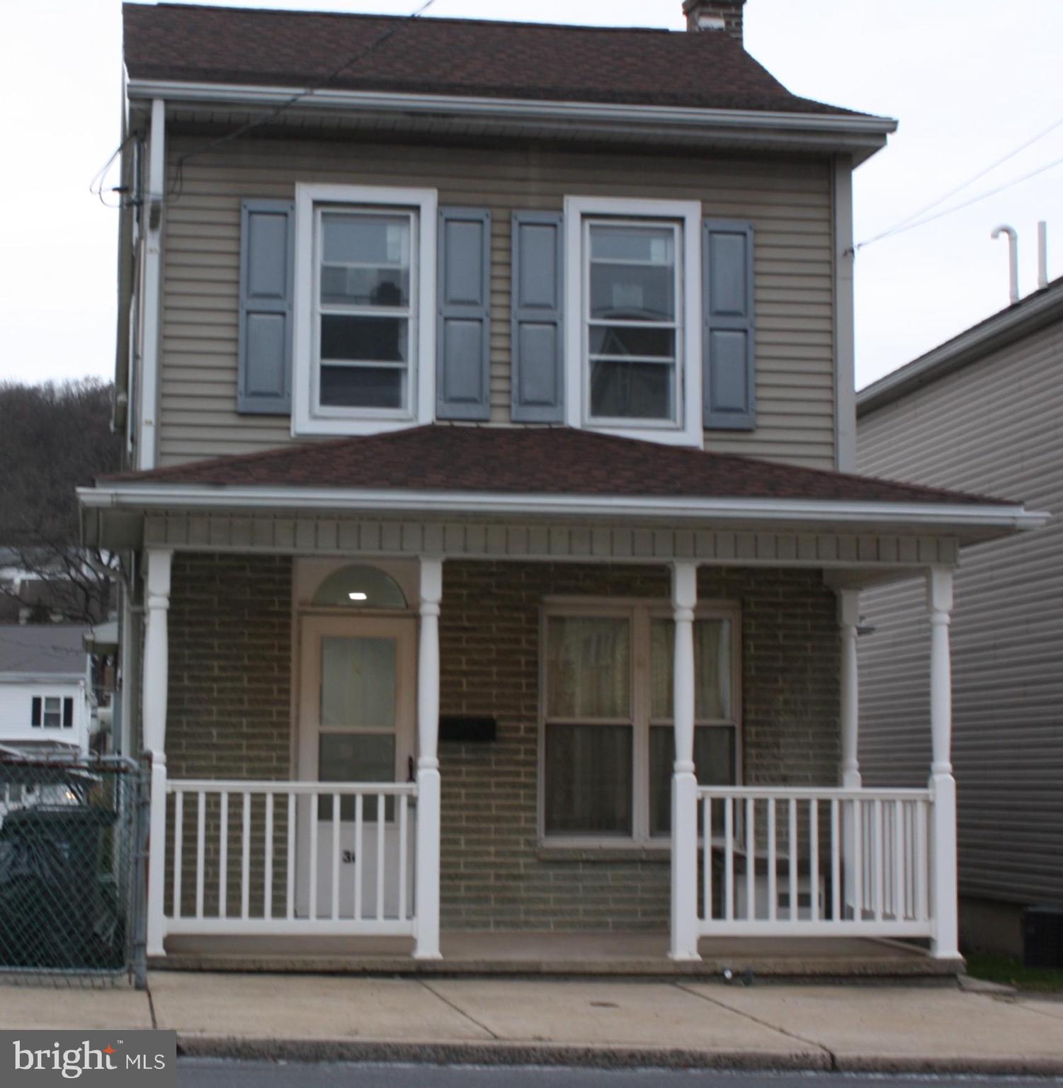 36 Chestnut Street Cressona, PA 17929 - Photo 1 of 28 a view of a brick house with large windows