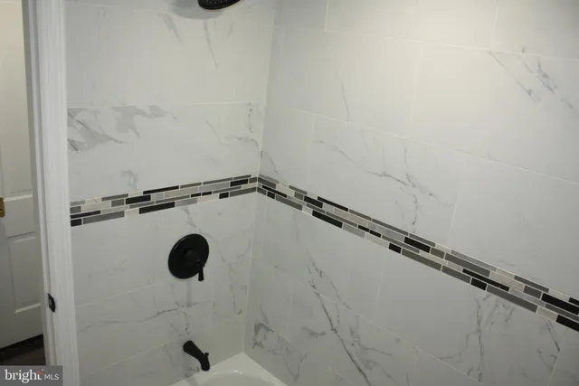 a close view of a shower in the bathroom