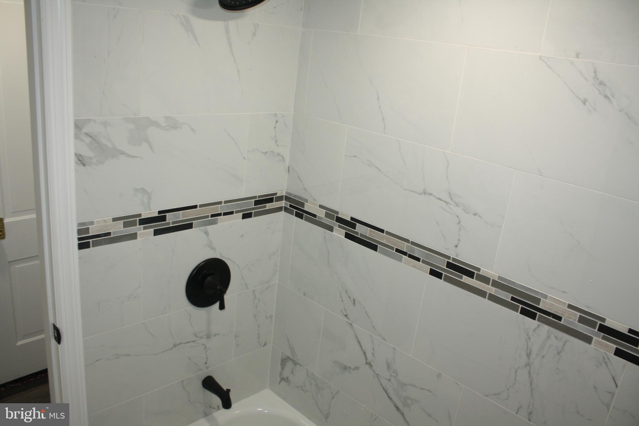 36 Chestnut Street Cressona, PA 17929 - Photo 11 of 28 a close view of a shower in the bathroom