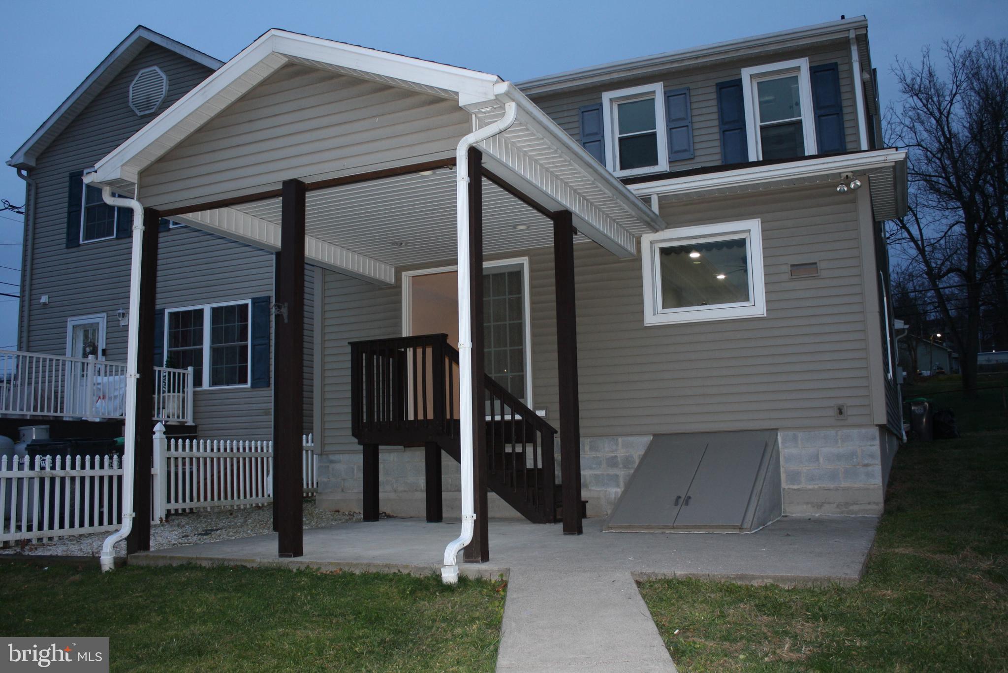 36 Chestnut Street Cressona, PA 17929 - Photo 2 of 28 a front view of a house with garden