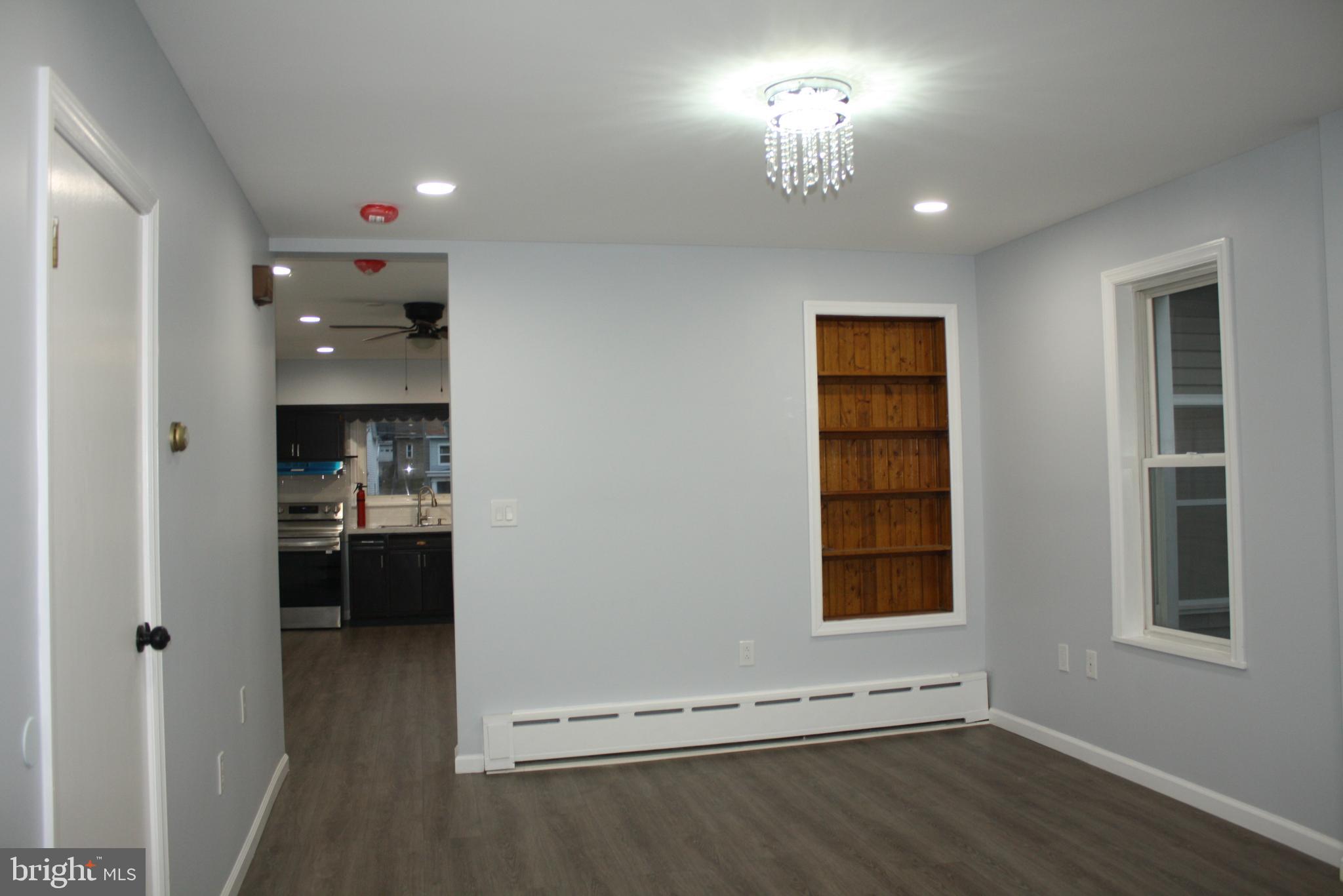 36 Chestnut Street Cressona, PA 17929 - Photo 6 of 28 a view of a room with a fireplace and window