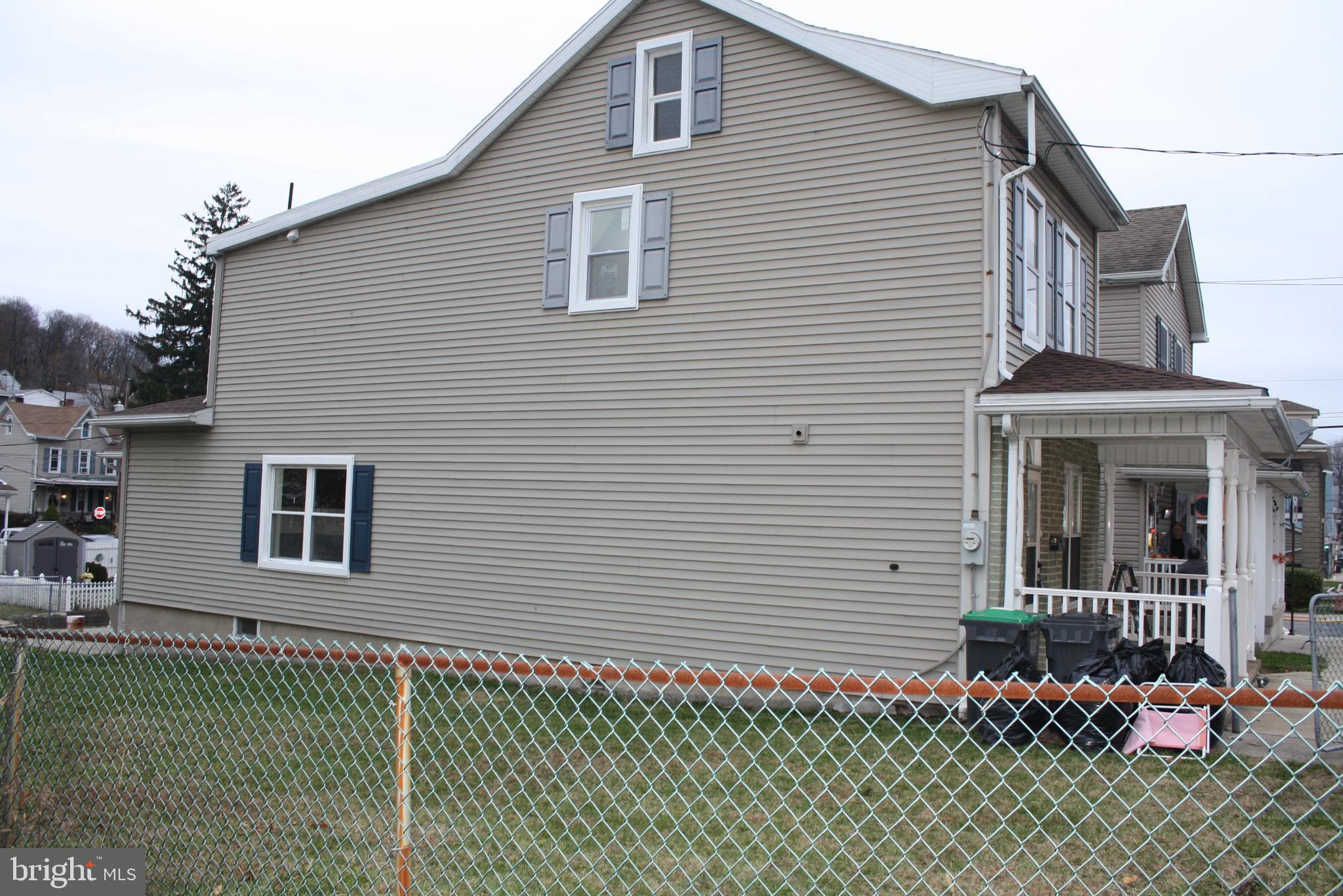 36 Chestnut Street Cressona, PA 17929 - Photo 6 of 29 a front view of a house with a garage