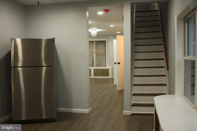 a view of entryway with wooden floor