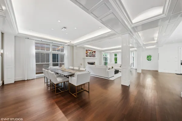 a kitchen with stainless steel appliances granite countertop a stove and a refrigerator