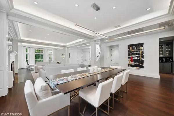 a kitchen with stainless steel appliances granite countertop a kitchen island a stove and a sink