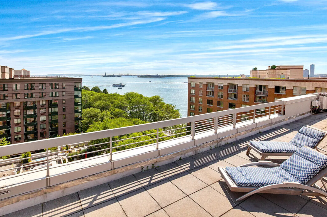 2 South End Avenue, Unit 8S Manhattan, NY 10280 - Photo 7 of 10 a view of a balcony with city view