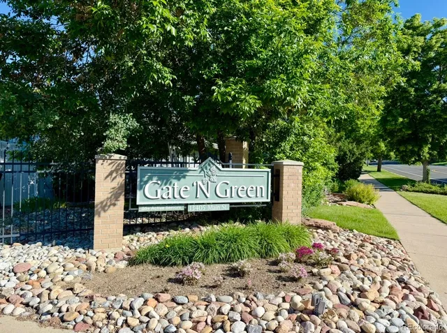 a view of a lake with a yard