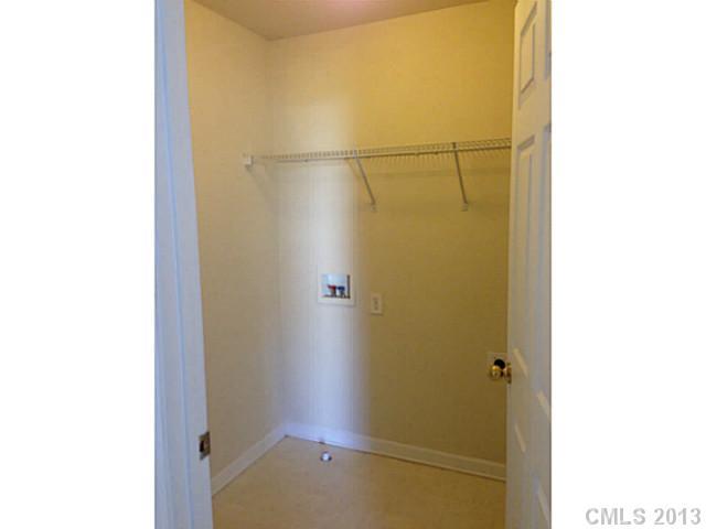 11406 Erwin Ridge Avenue Charlotte, NC 28213 - Photo 12 of 16 a bathroom with a glass door