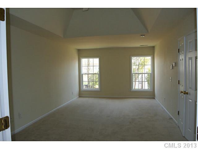 11406 Erwin Ridge Avenue Charlotte, NC 28213 - Photo 15 of 16 a view of an empty room with a window